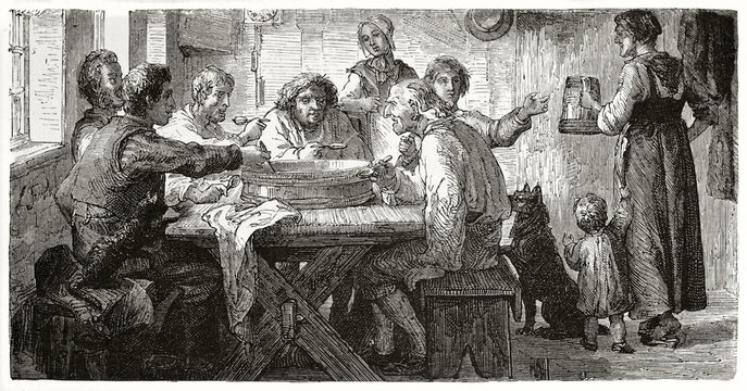 Ancient poor farmers seated on a wooden table eating all from a sole plate in a room. Old illustration of Danish peasants having a meal. Created by Frohlich published on Le Tour du Monde Paris 1862