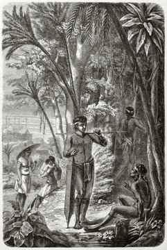 Two ancient native Dayak hunters speaking in the thick jungle wearing their traditional hunting equipement. By Lancon after Dutch colonies iconographic atlas  published on Le Tour du Monde Paris 1862