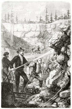 Ancient gold prospectors washing rocks with a hydraulic pump in a cave in California. By Chassevent and Gauchard after previous engraving by unknown author published on Le Tour du Monde Paris 1862