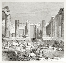 Ancient majestic greek ruins and columns standing next to few small people. Old view of Propylaea in the Athenian Acropolis. Created by Therond published on Le Tour du Monde Paris 1862