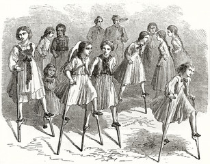Fototapeta na wymiar Old illustration of girls playing on stilts. Created by Lancelot published on Le Tour du Monde Paris 1862