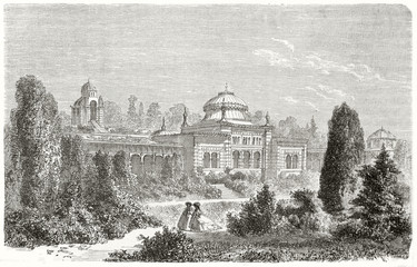 Ancient large view of Wilhelma zoological-botanical garden in Stuttgart, Germany, surrounded by luxuriant vegetation with two ladies walking. Created by Lancelot on Le Tour du Monde Paris 1862