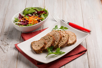 homemade meatloaf with mixed salad