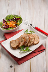 homemade meatloaf with mixed salad