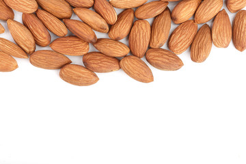 almonds isolated on white background with copy space for your text. Top view. Flat lay