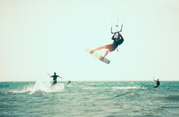 Kitesurfing Kiteboarding action photos man among waves quickly goes © Mediteraneo