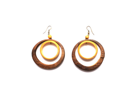 Wooden handmade earrings isolated on white background