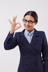 asian business woman showing ok hand sign