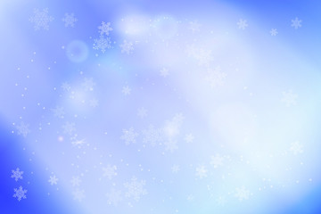 Fototapeta na wymiar Pastel blue bokeh background with snowflakes and light effects. Merry Christmas on Happy New Year banner or header