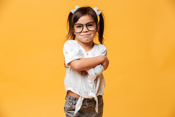 Cheerful little girl child wearing glasses