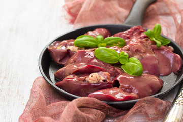 raw chicken liver with black pepper