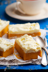 Pumpkin Bars with cream cheese fristing.