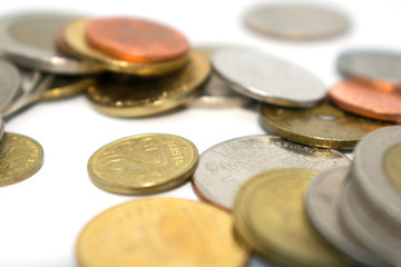 A photo of a large number of coins of different states.