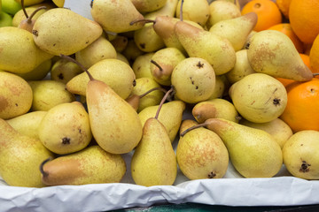 Fresh yellow pears for sale at Porto market (Mercado do Bolhao). Portugal