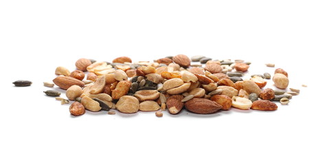 Healthy mix of salty and spicy peanuts, almonds, sunflower, and pumpkin seeds, isolated on white background