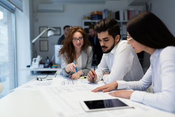 Group of architects working together on project
