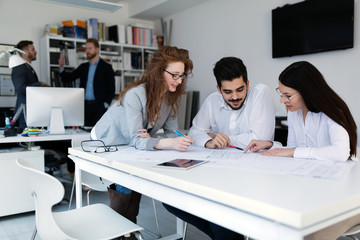 Group of architects working together on project