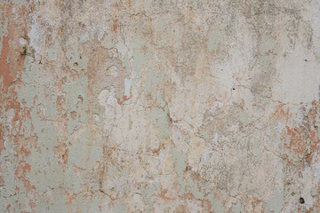 Wall fragment with scratches and cracks