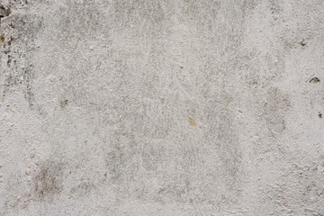 Wall fragment with scratches and cracks