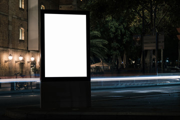 Blank white advertisement lightbox at night. Commercial mock-up design.
