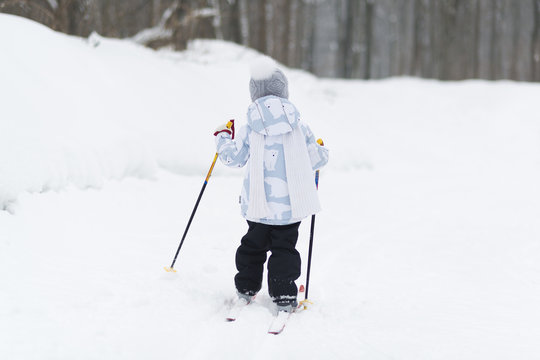 Child cross-country skiing