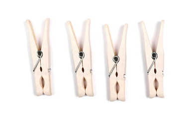 White clothespins isolated on white background, top view