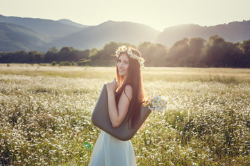 Beautiful happy woman outdoors in countryside