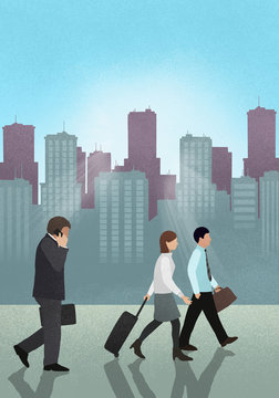 Side view of business people walking against skyscrapers