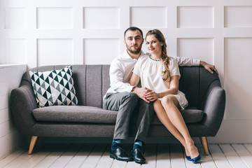 Obraz premium Young family on therapy session with family psychologist, natural light