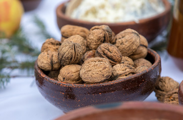 Walnuts in a ceramic pot