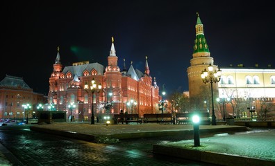 Fototapeta premium View of the Historical Museum near red Square at night. Moscow, Russia/ In Gothic style, of red brick. Taken late evening, before Christmas, festive illumination and decoration of the city