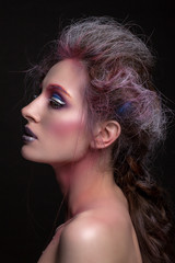 beautiful woman with creative hair and makeup