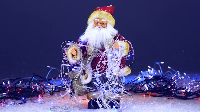 Santa Claus with Christmas garlands