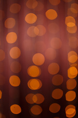 Defocused abstract red christmas background. Bokeh lights