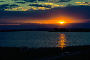 Fototapeta na wymiar river at sunset