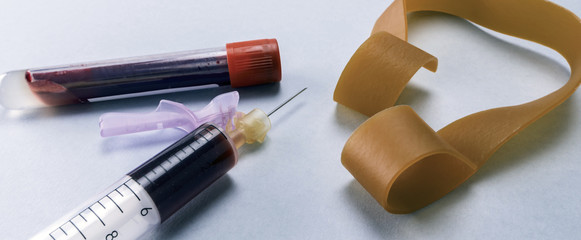 Blood vials in hospital palliative care table, conceptual image