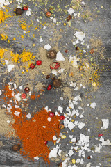 Various spices on a black background. Top view. Food background