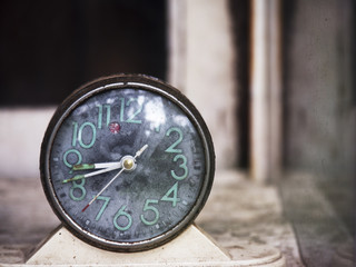 Vintage old clock on the floor for time