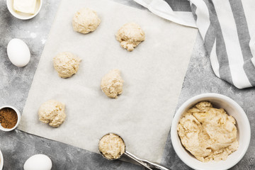 Ingredients for baking of cookies - flour, eggs, spices, vanilla, butter, sugar. Top view. Food background