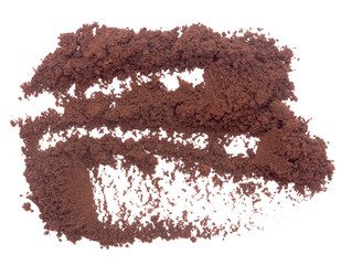 Ground coffee on white