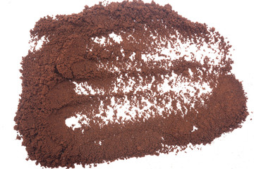 Ground coffee on white