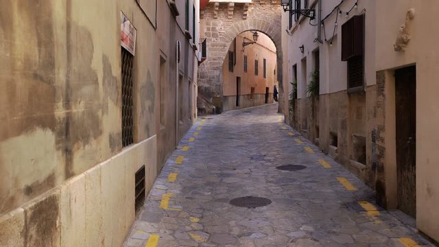 Narrow street in the Palma de Mallorca, Spain