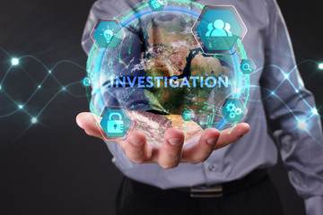 The concept of business, technology, the Internet and the network. A young entrepreneur working on a virtual screen of the future and sees the inscription: Investigation