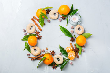 Christmas cookies wreath with spices and tangerine