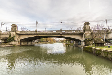 bridge over river in the city. Late autumn