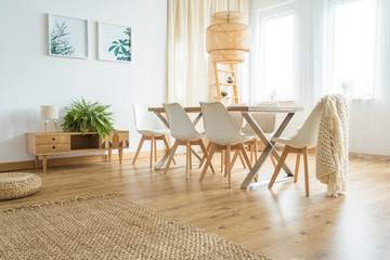 Wooden table near window