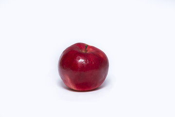 Delicious, juicy, tasty red apple isolated on white background