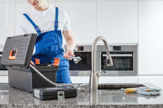 Toolbox and gloves on countertop