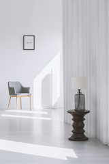 Lamp on table in hall