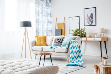 Blue blanket and patterned pillow